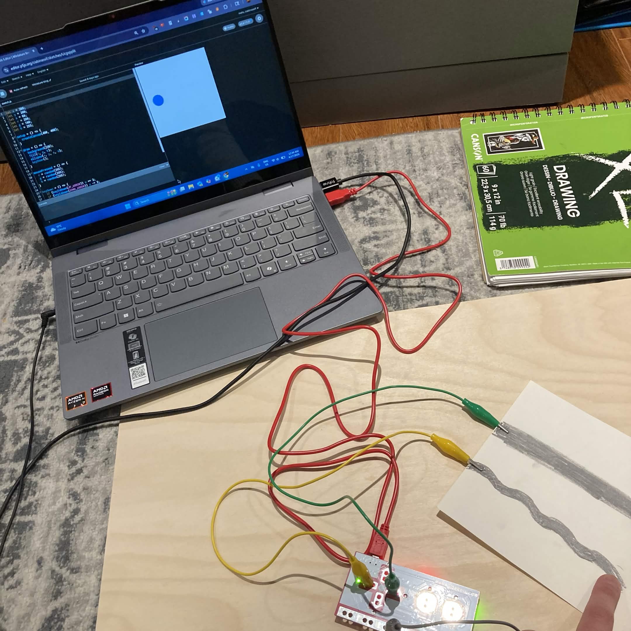 Testing out the graphite input strength on the Makey Makey to make the circle move from side to side